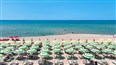 foto plaz hotela Mimose Beach Village v Badesi na talianskom ostrove Sardinia